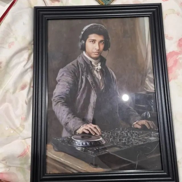 Framed portrait of a young man as an 18th-century DJ at the turntables