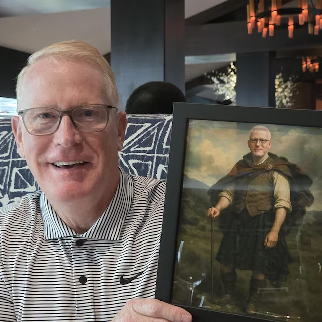 Customer holding a delivered custom portrait